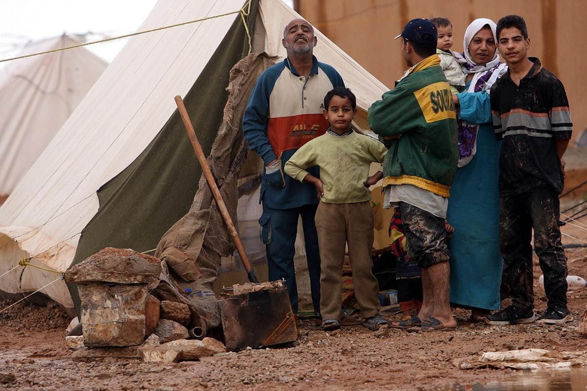A Palestinian family displaced from Iraq, near the Jordanian border