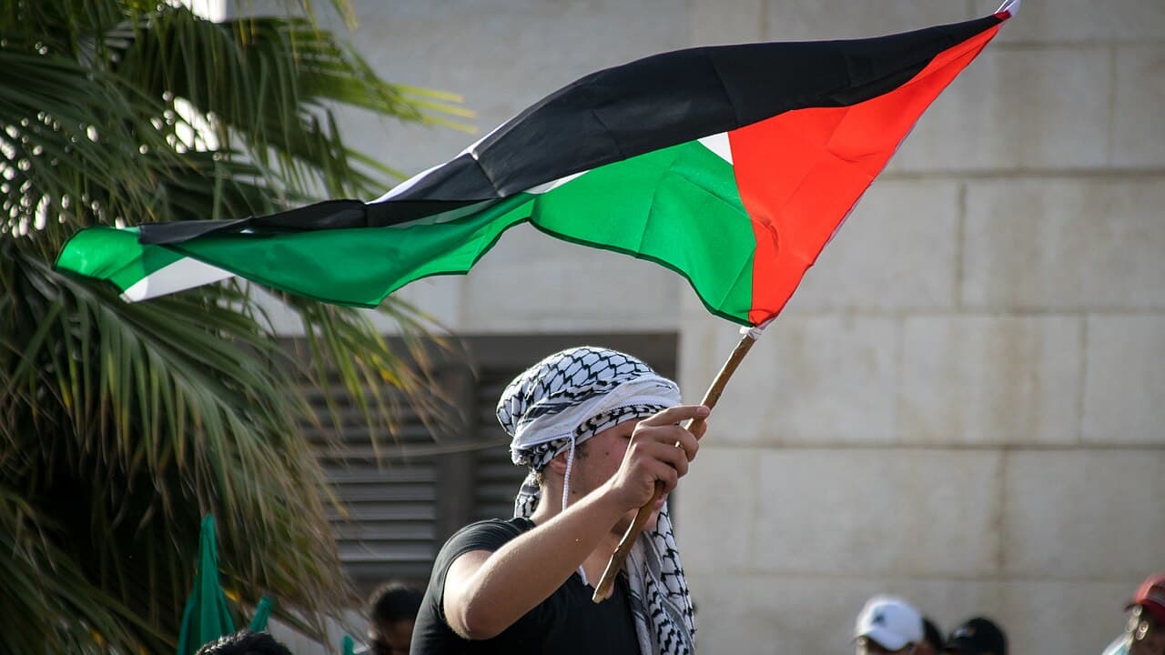 Palestinian flags at a demonstration in Amman, May 2021